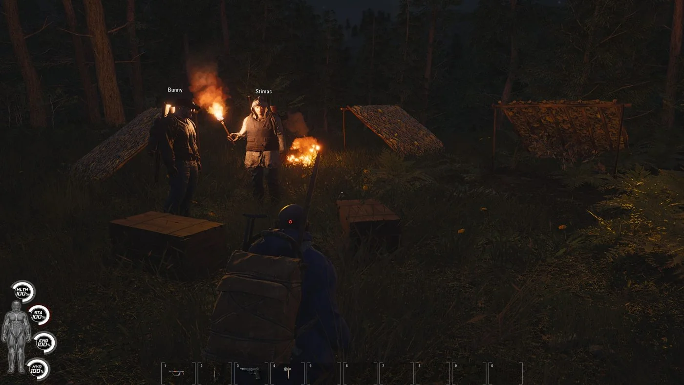 SCUM camp at night with other prisoners in a forest clearing